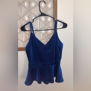 Dressy blouse: A-line, spaghetti strap, dark blue with silver shimmery accents.